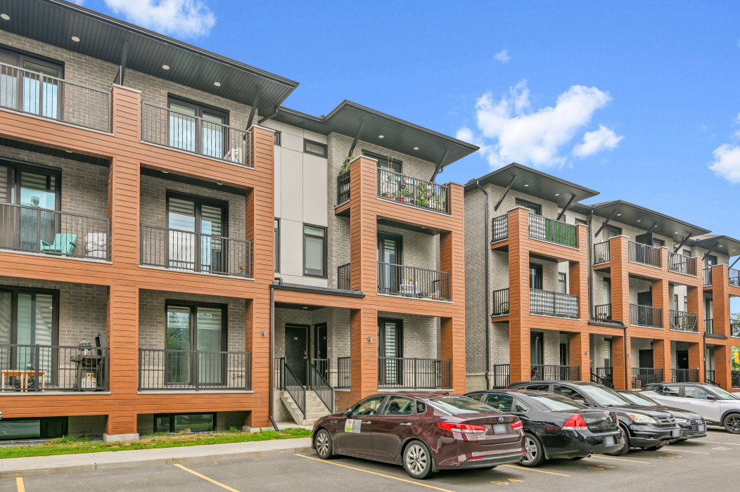 Exterior of a charming 2-bedroom townhouse located at 358 Rhonda Stewart Pvt in Kanata.