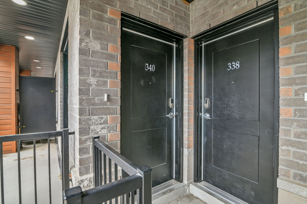 Close-up of the welcoming front door of a 2-bedroom townhouse in Kanata, Ottawa.