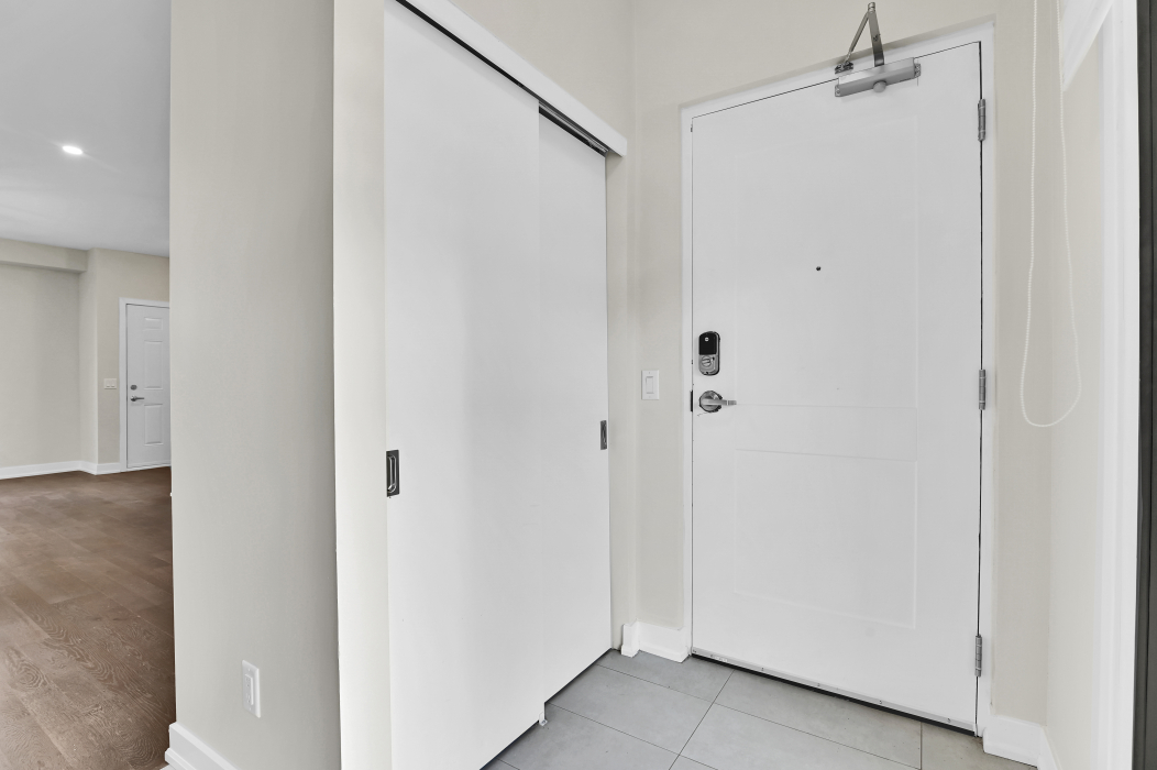 Functional mudroom area within a 2-bedroom unfurnished townhouse in Stittsville.