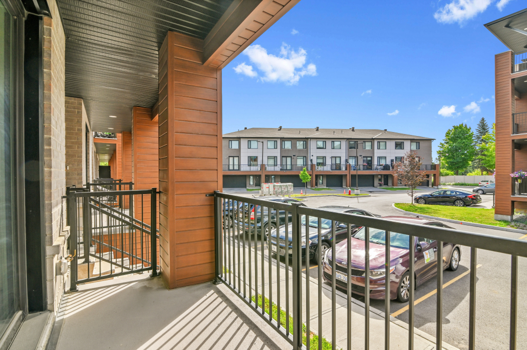 Private balcony offering city views from a 2-bedroom townhouse in Ottawa.