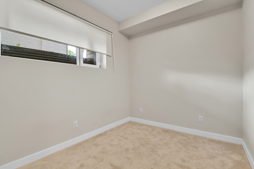Cozy bedroom with natural light in a 2-bedroom townhouse in Stittsville, Kanata.