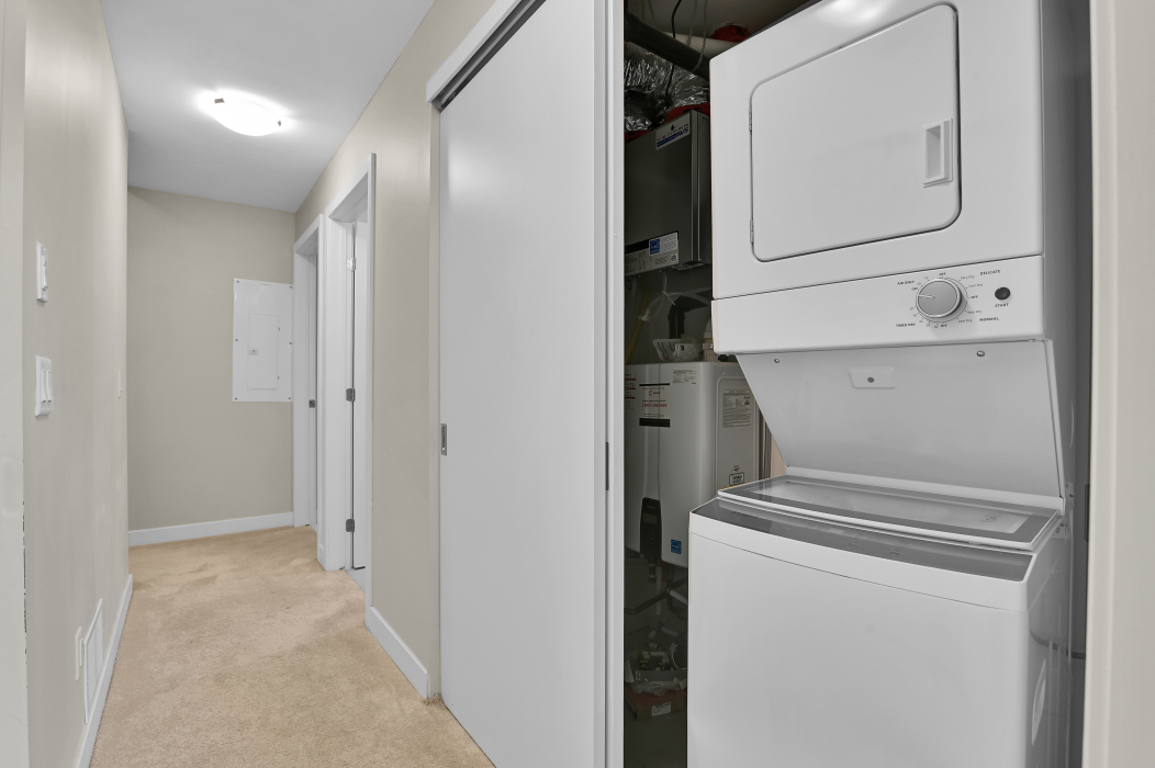 In-unit washer and dryer conveniently located in a 2-bedroom Kanata townhouse.