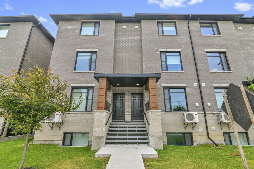 Steps leading from the back door of a 2-bedroom townhouse in Stittsville, Ottawa.