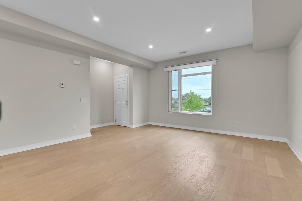 Spacious living room in the 2-bedroom townhouse on Rhonda Stewart Pvt.