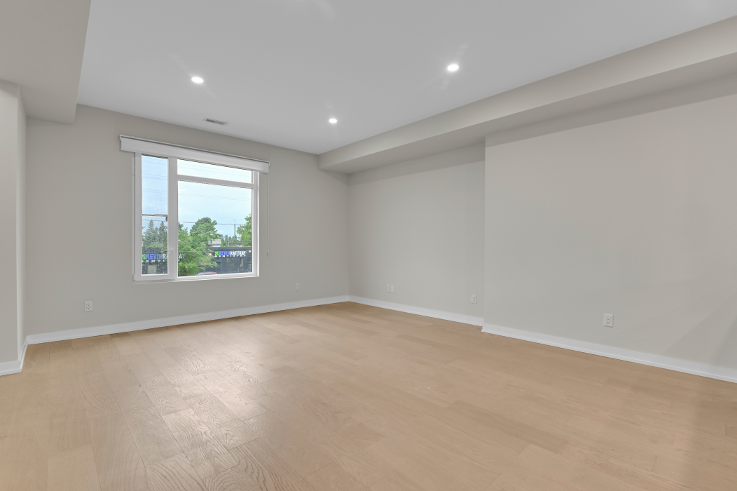 Comfortable living area of the unfurnished 2-bed townhouse.