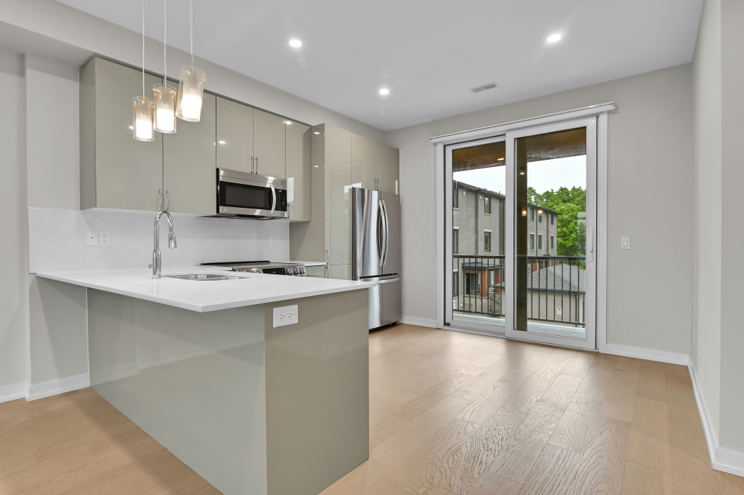 Modern kitchen within the 2-bedroom townhouse in Stittsville.