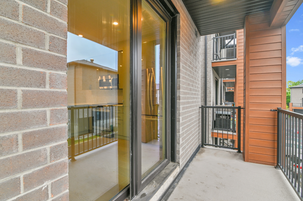 Balcony doors in the kitchen of the 2-bedroom townhouse.