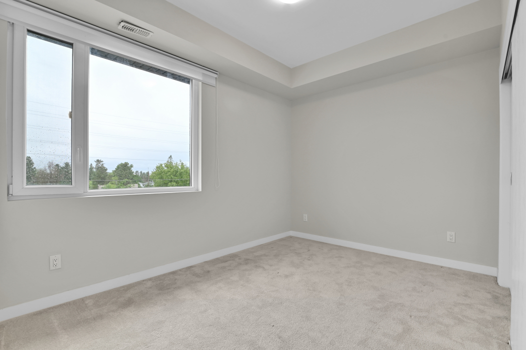 A bedroom in the unfurnished 2-bedroom townhouse, Kanata.