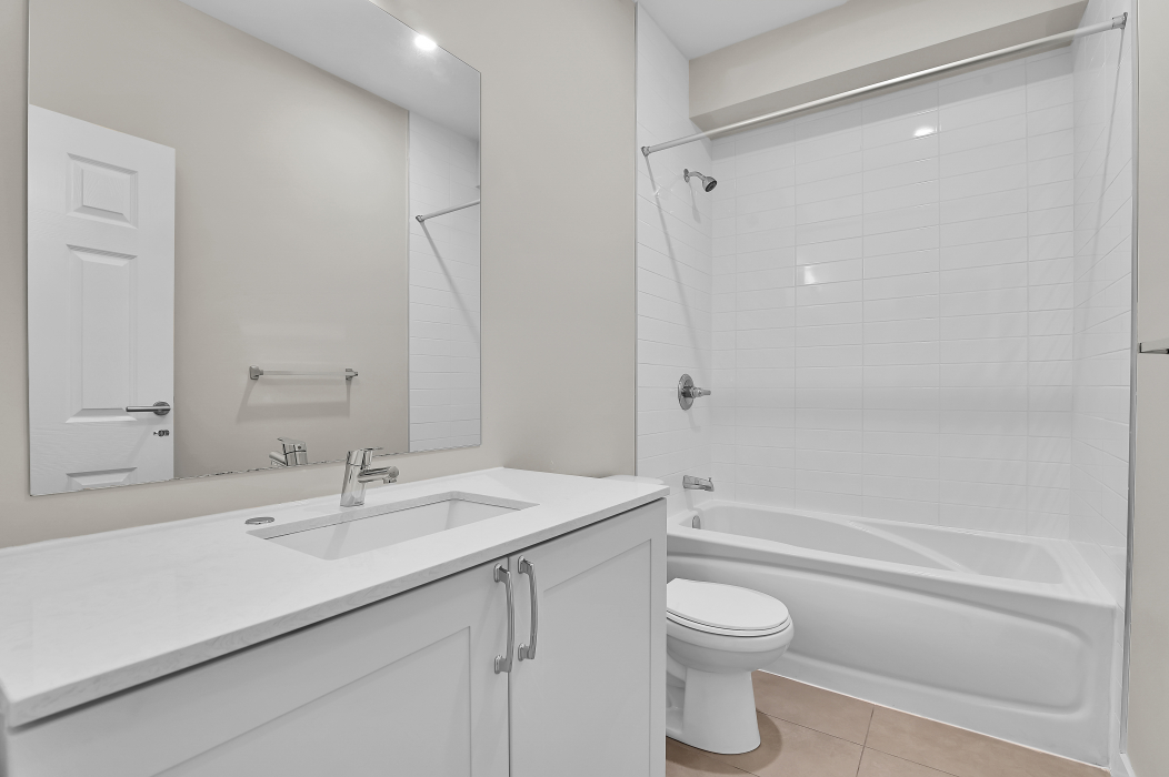 Full bathroom servicing the 2-bedroom townhouse.