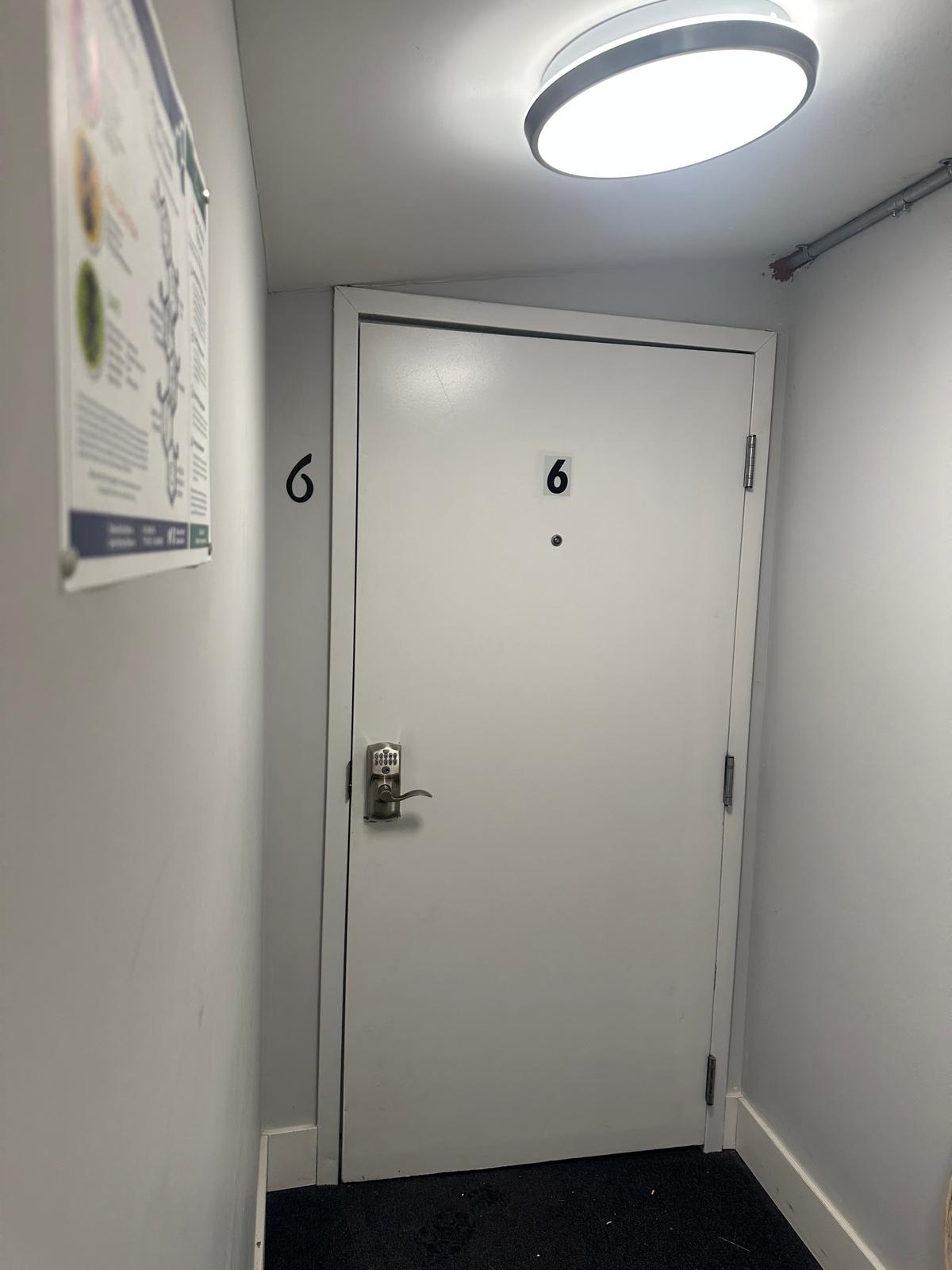 Modern front door of a 1-bedroom apartment in Ottawa's vibrant Centretown neighborhood.